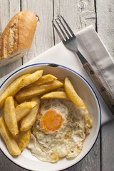 Fried egg with fries