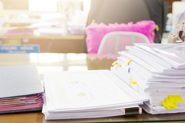 Pile of unfinished documents on office desk, Stack of business paper