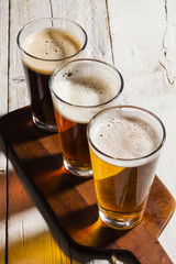 Assorted beers in a flight ready for tasting