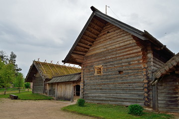 Fototapeta na wymiar Old Russian log hut in Pushkin Mikhailovskoe