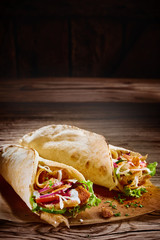 Two tasty doner kebabs with rustic copy space