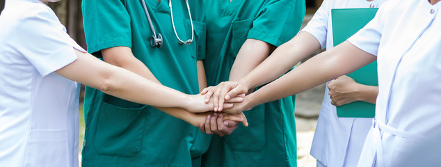 Doctors and nurses coordinate hands. Concept Teamwork - 155388605