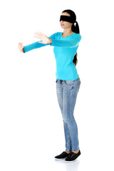 Confused blindfolded woman