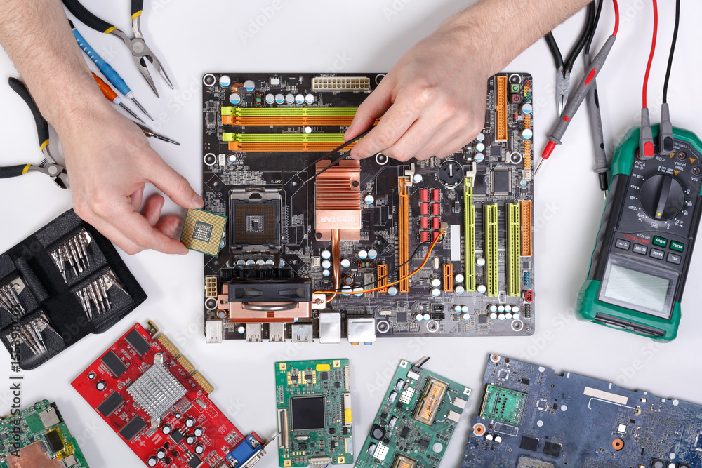 Poster Computer upgrade. Technician plug in microprocessor to motherboard