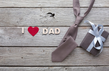 Happy Fathers Day card on rustic wood background