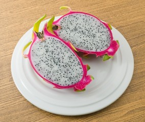 Fresh Ripe Dragon Fruit on A White Plate