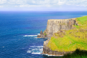 Cliffs of Moher, west coast of Ireland, County Clare at wild atlantic ocean