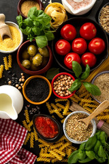 Food background Food Concept with Various Tasty Fresh Ingredients for Cooking. Italian Food Ingredients. View from Above.