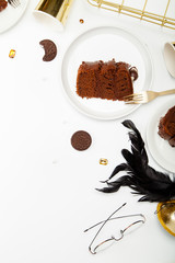Vertical mockup with pieces of chocolate cake, white roses and delicious cookies. Polished and chic branding concept