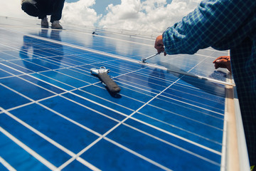 engineer and electrician team swapping and install solar panel ; electrician team checking hot spot...
