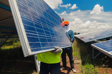 engineer and electrician team swapping and install solar panel ; electrician team checking hot spot...