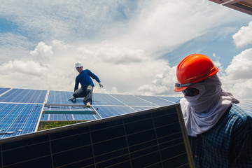 engineer and electrician team swapping and install solar panel ; electrician team checking hot spot on break panel
