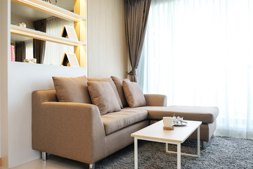 brown sofa in living room.
