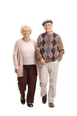 Elderly couple walking towards the camera