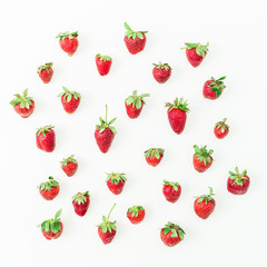 Sweet strawberries on white background. Flat lay. Top view. Summer pattern.