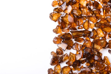 Brown Amber stones on white background