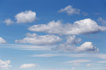 Cumulus and cirrus clouds