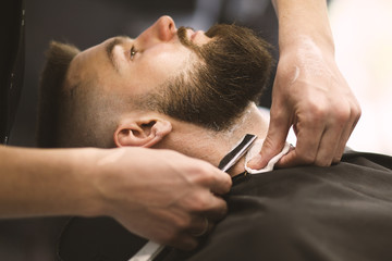 Professional barber doing a haircut