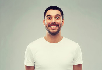 man with funny face over gray background