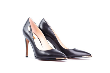 Pair of black elegant high heel shoes isolated on white background