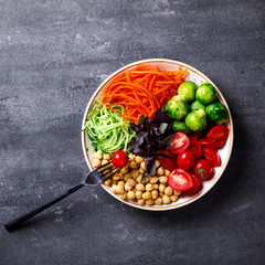 Raw mixed Vegetables and chickpeas.Vegetarian Buddha Bowl. Food or Healthy diet Concept.Super Food.Copy space for Text. selective focus.