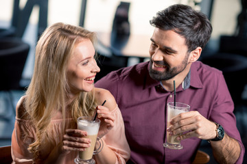 romantic couple in love spending time together on coffee break in restaurant