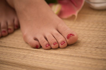 female feet at spa salon