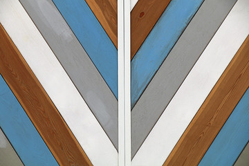 Wall construction of diagonal colored boards