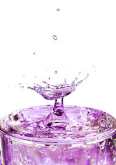 Colorful liquid splash isolated on white background closeup