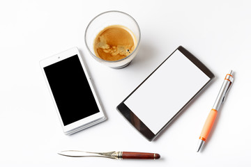 Espresso and mobile cafe on a white table in the office
