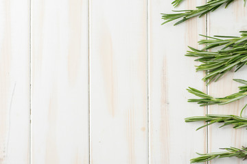 Rosemary on a table with copy space