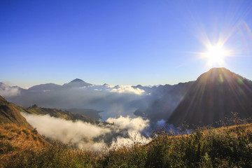 Fototapeta premium Cloudy and mist in Mountain Rinjani, active volcano at Lombok island of Indonesia