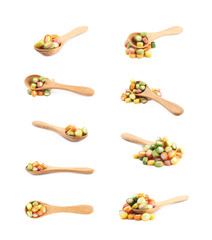 Spoon full of licorice candies isolated