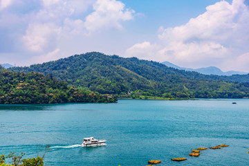 Fototapeta na wymiar View of Sun Moon Lake with a boat