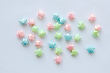  colorful star paper spreading on white background