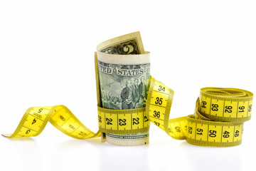 measure tape and dollar banknote isolated on white