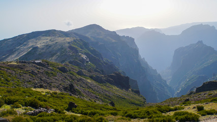 Madeira - Pico do Arieiro canyon with green meadows in the afternoon
