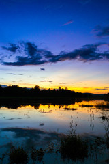 Beautiful sunset reflected in the lake.