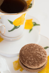 chocolate macaroon cake with cup of coffee