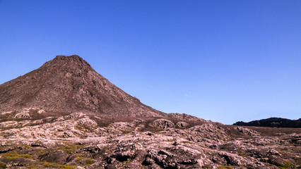 Panorama inside crater of Pico volcano and Piquinho pinnacle at Azores, Portugal