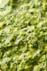 Closeup macro cooked spinach vegetable food background