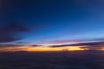 Fototapeta na wymiar sunset sky on airplane