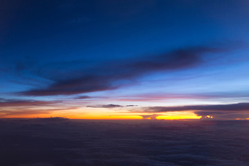 Fototapeta na wymiar sunset sky on airplane