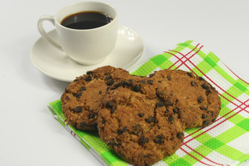 Coffee cup with oatmeal cookie chocolate on white background