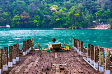 Boat on a wooden raft
