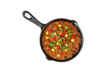Traditional mexican tex mex chili con carne in a frying pan isolated on white background
