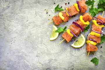Raw salmon kebab.Top view with copy space.