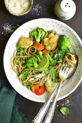 Wholewheat organic pasta with vegetables.Top view.