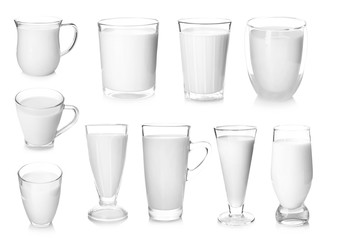 Glasses of fresh milk on white background