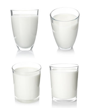 Glasses of fresh milk on white background